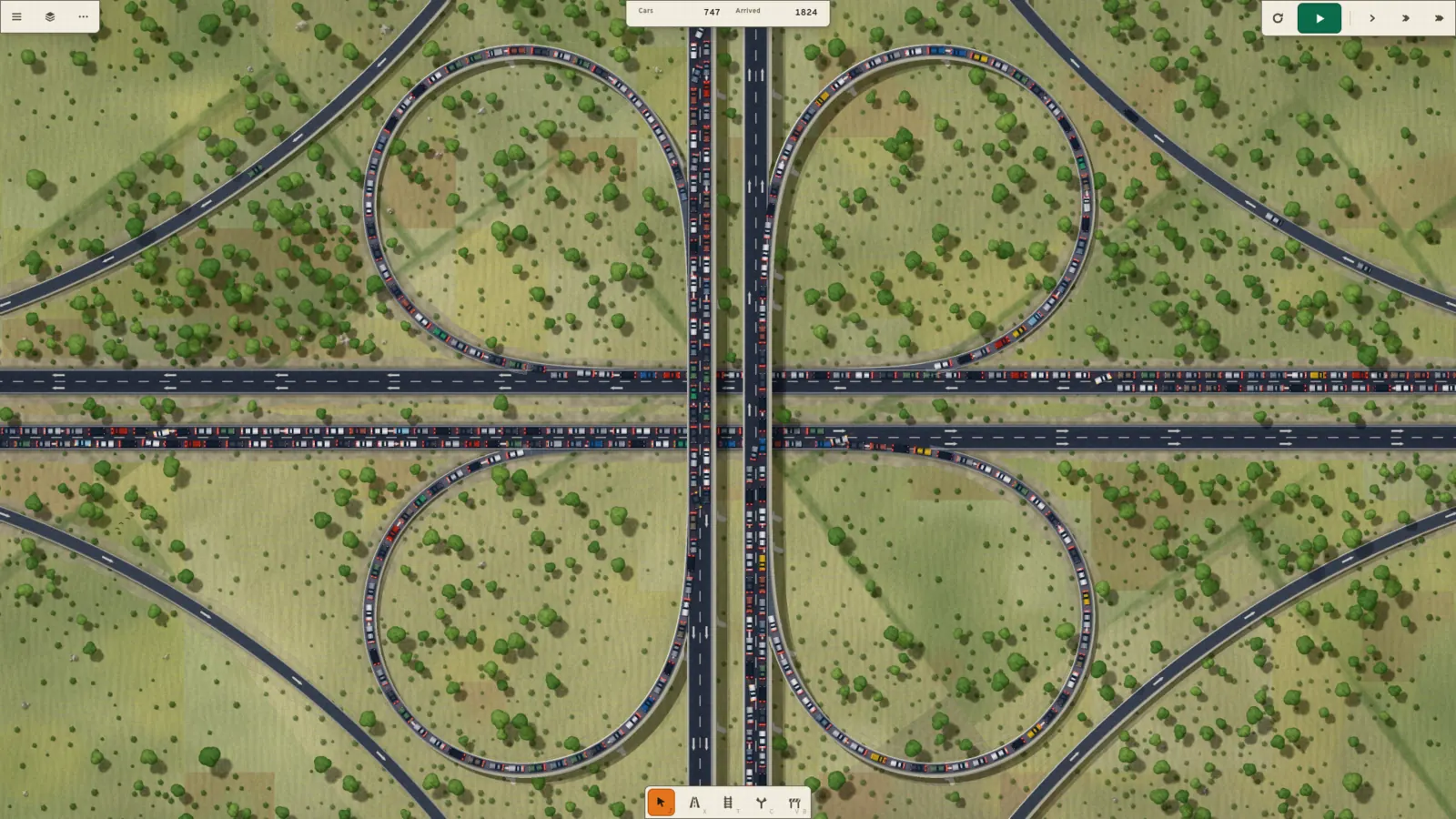 A cloverleaf interchange seen from directly above, its four loop ramps standing full of queued cars.